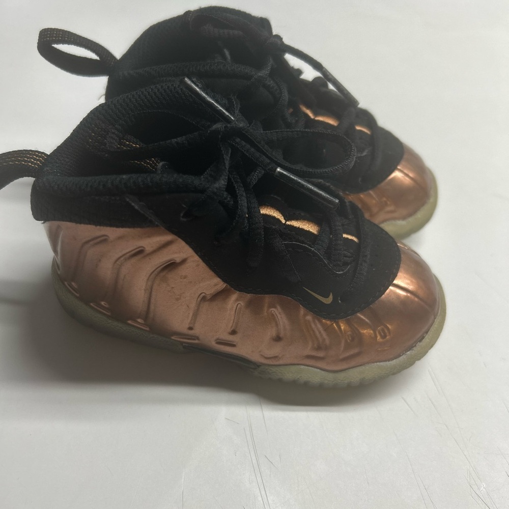 Nike Gold and Black Sneakers with Ribbed Design